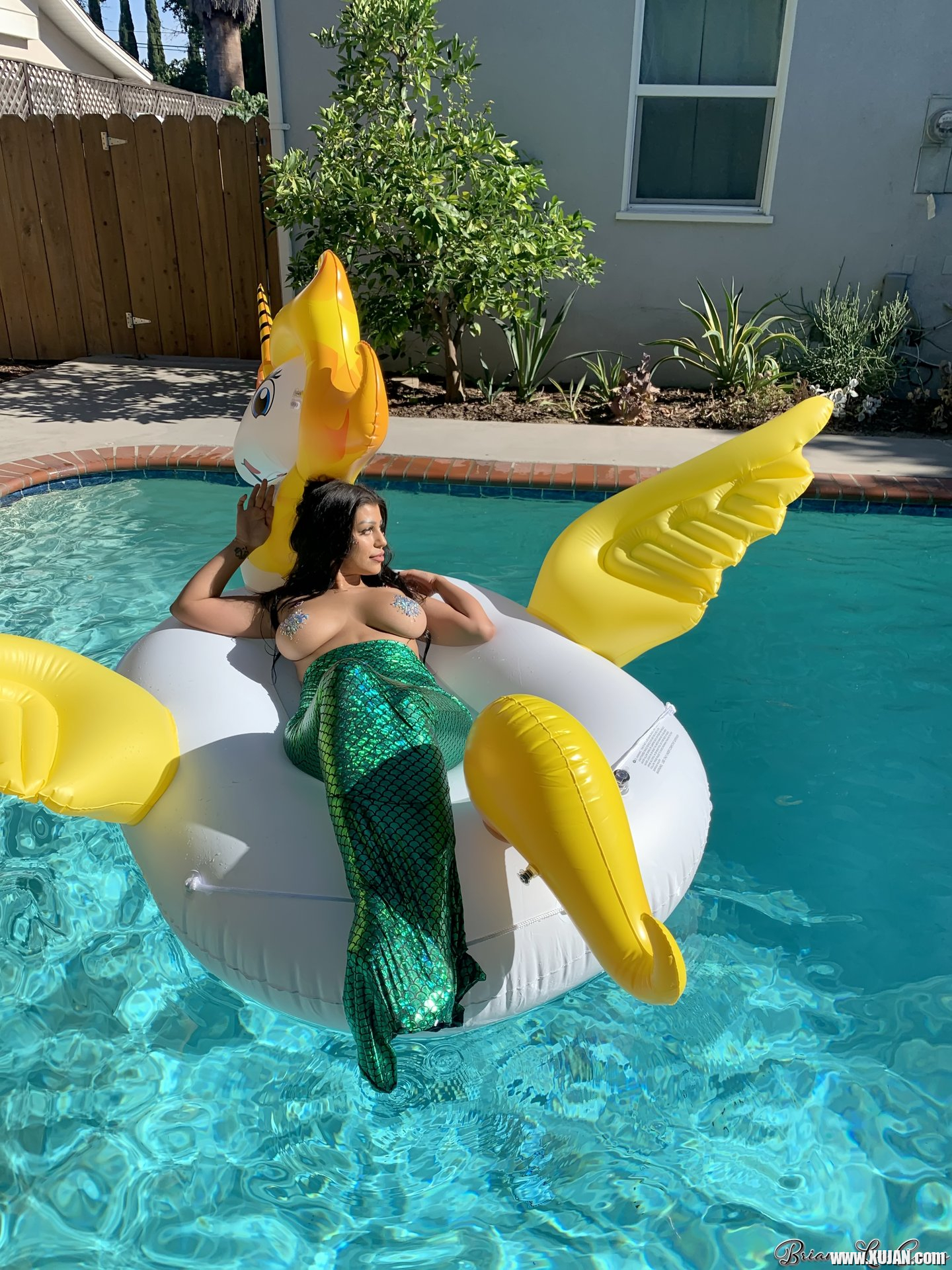 Briana Lee shows big Tits in Mermaid Suit in Pool - Photo #3428454