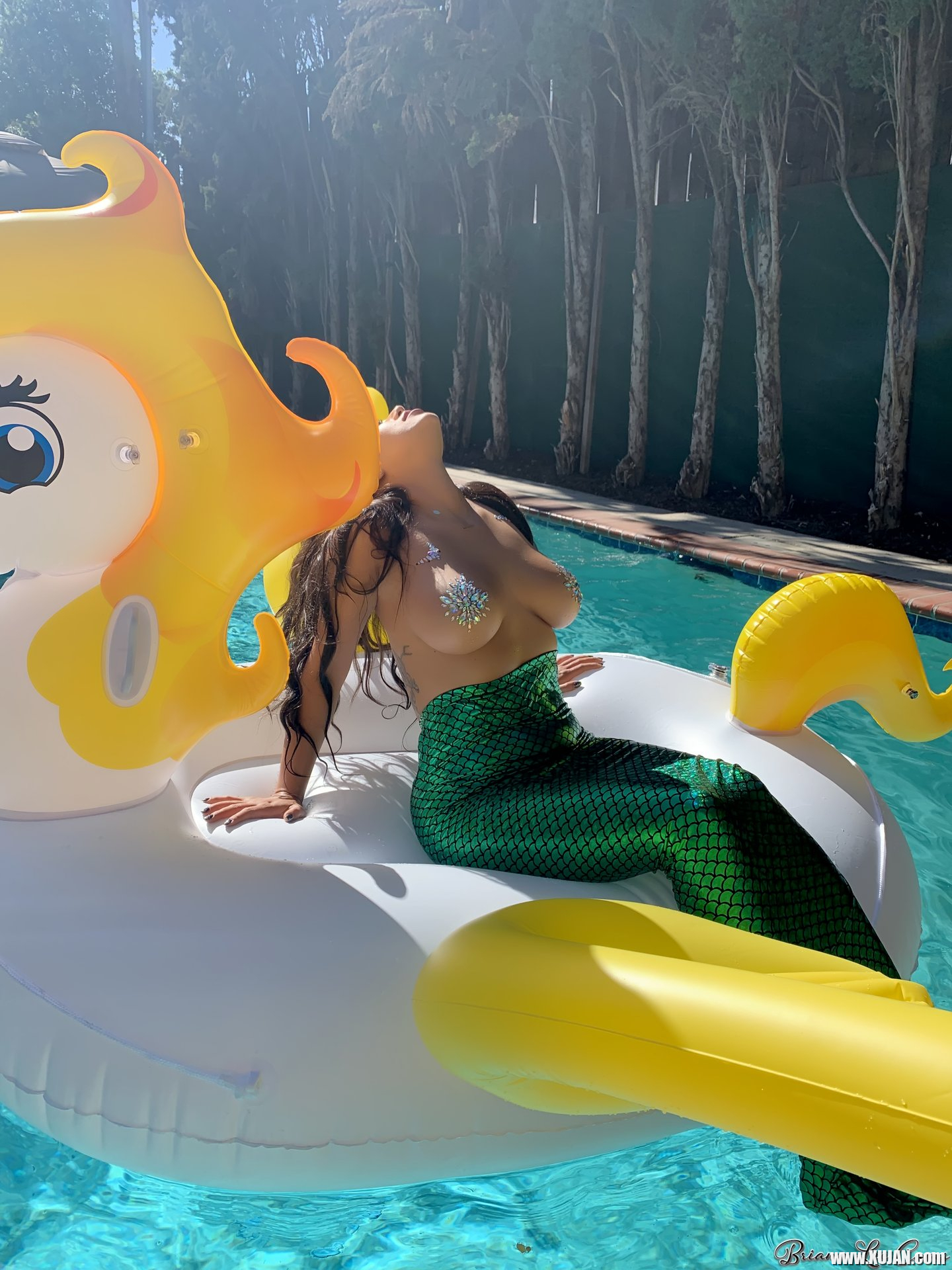 Briana Lee shows big Tits in Mermaid Suit in Pool - Photo #3428457