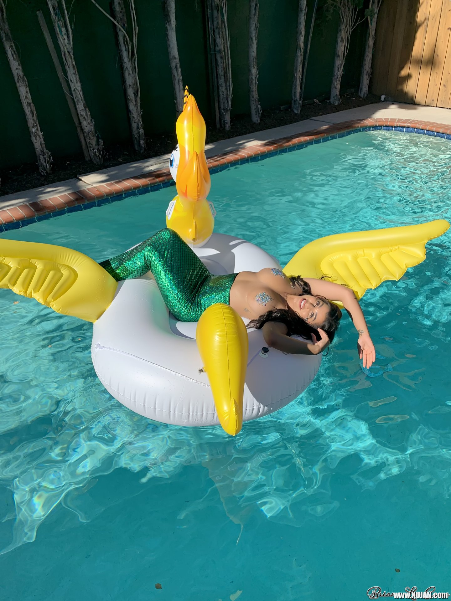 Briana Lee shows big Tits in Mermaid Suit in Pool - Photo #3428459