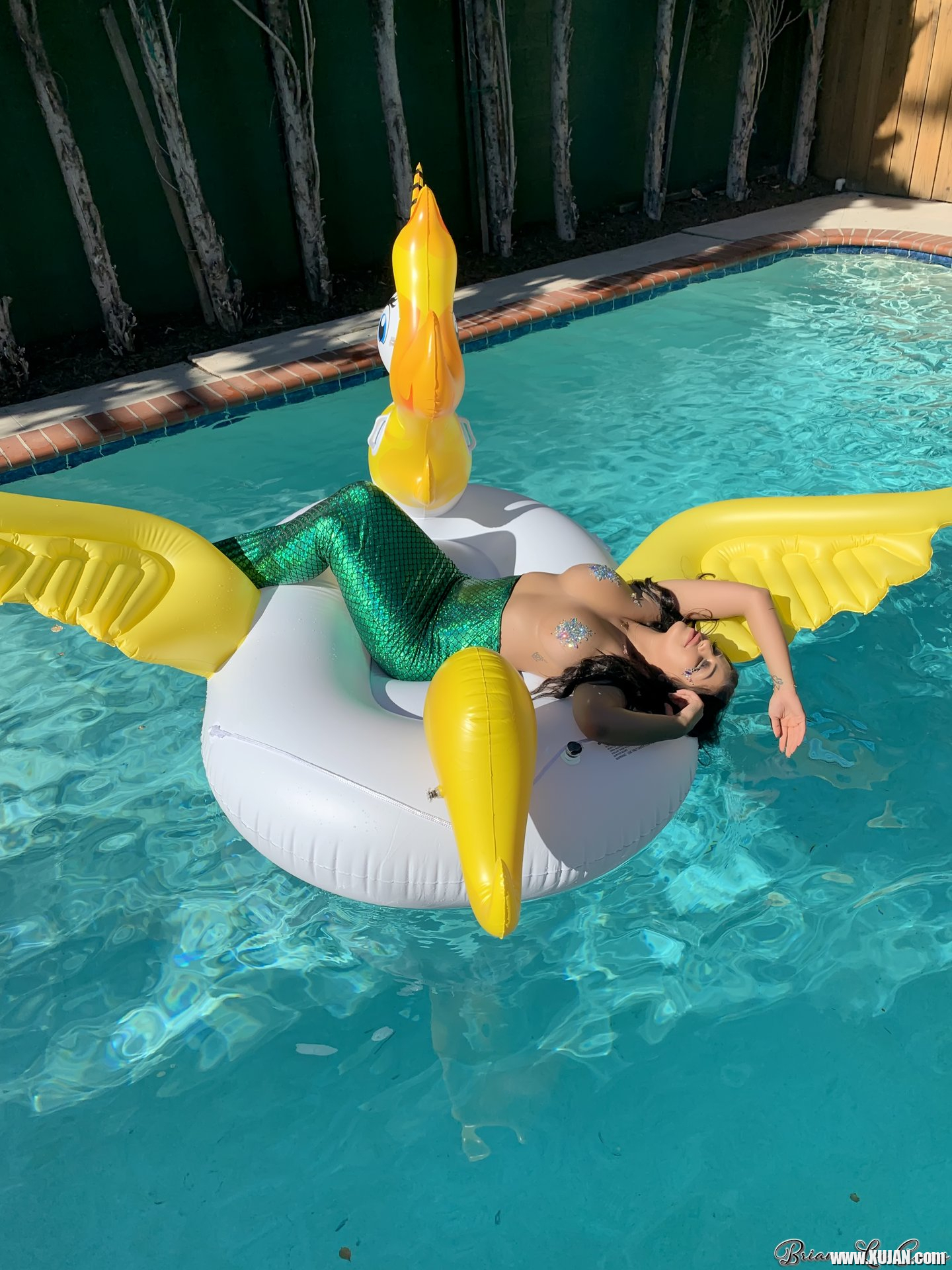 Briana Lee shows big Tits in Mermaid Suit in Pool - Photo #3428460