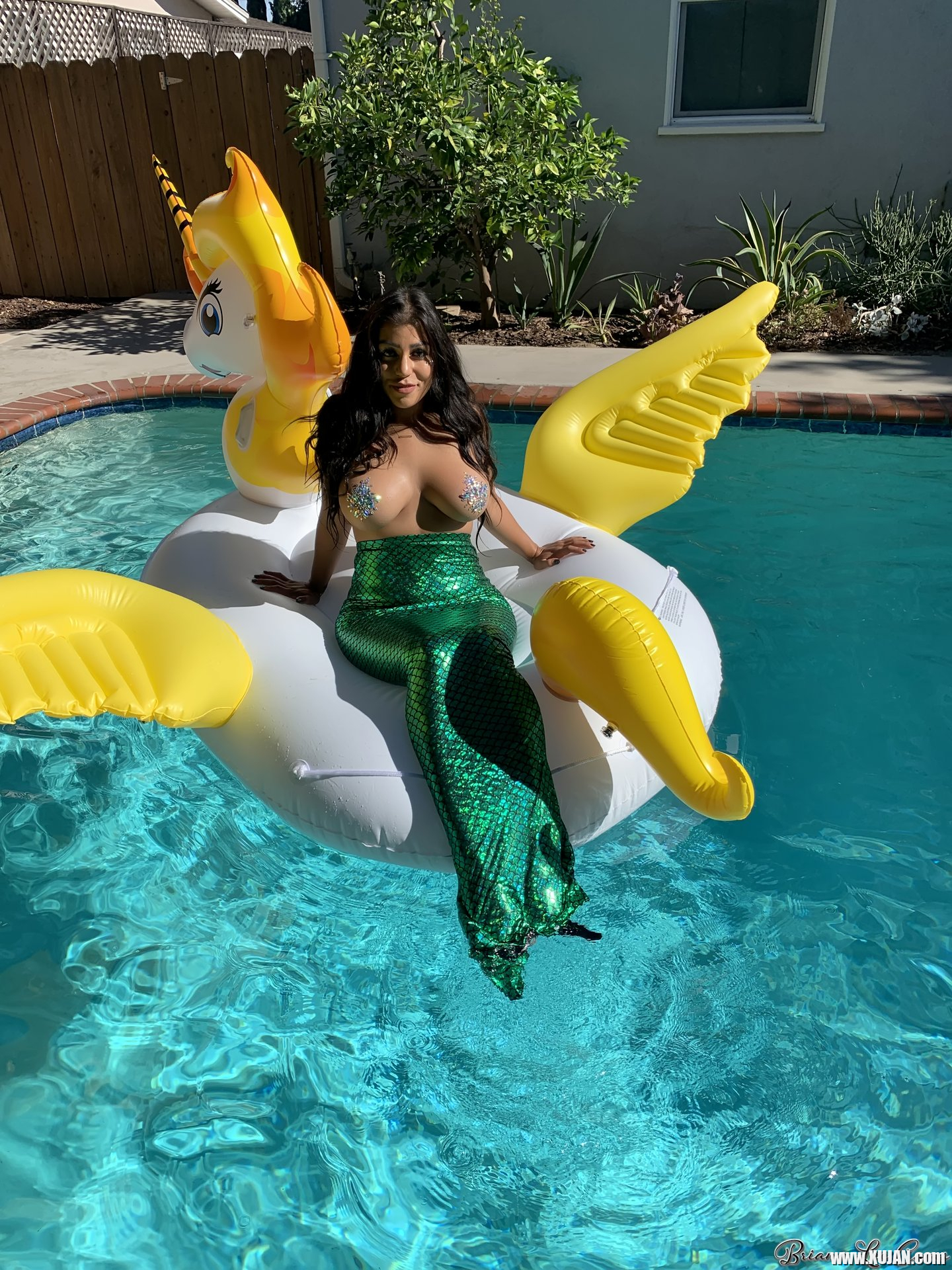 Briana Lee shows big Tits in Mermaid Suit in Pool - Photo #3428461