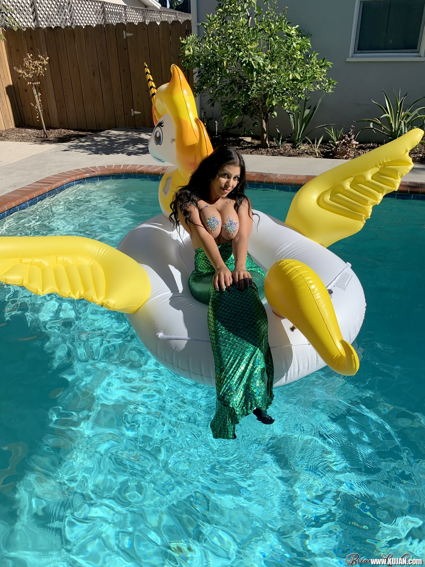 Briana Lee shows big Tits in Mermaid Suit in Pool - Photo #3428464