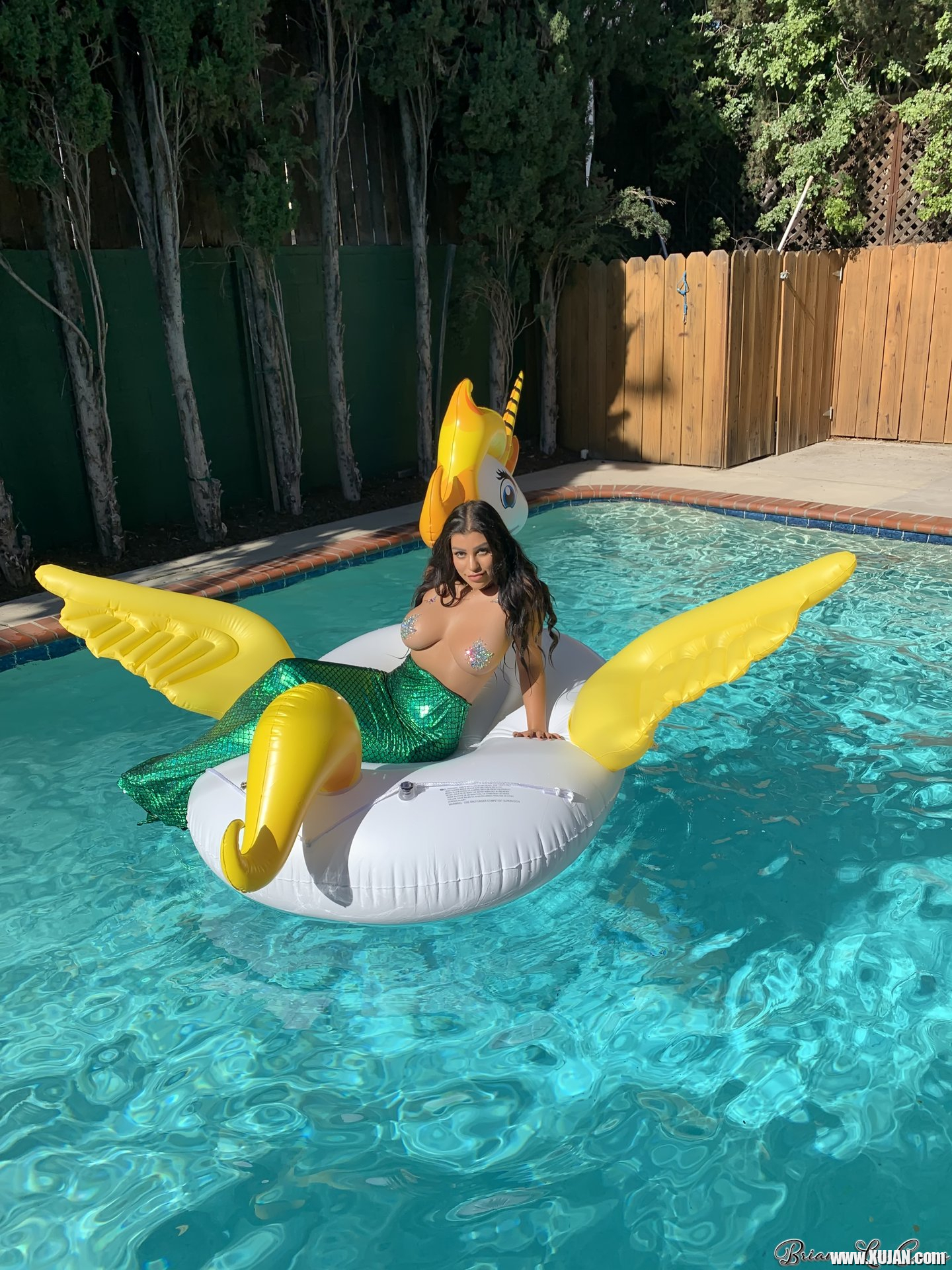 Briana Lee shows big Tits in Mermaid Suit in Pool - Photo #3428466