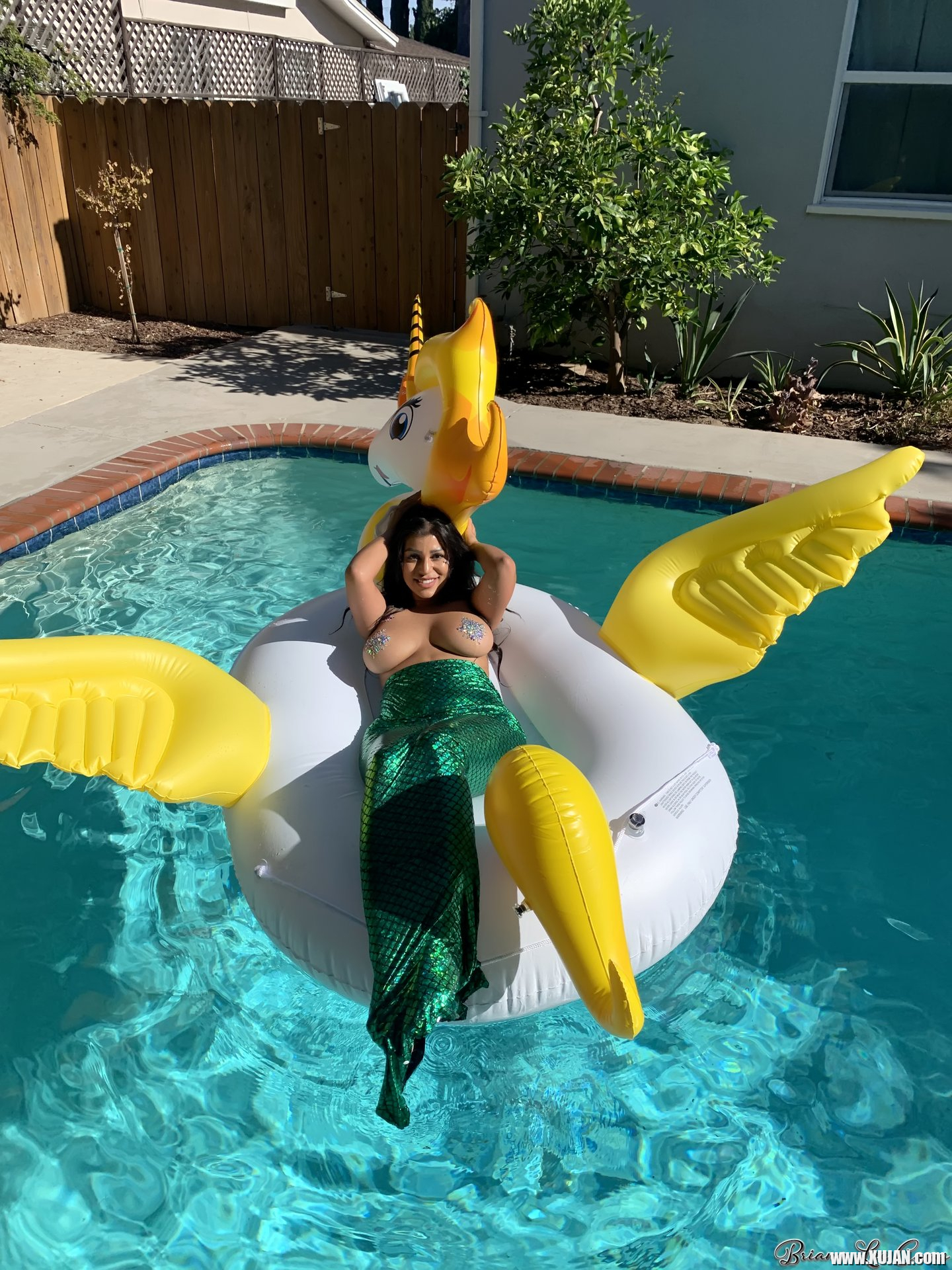Briana Lee shows big Tits in Mermaid Suit in Pool - Photo #3428467
