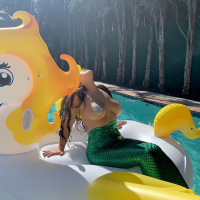 Briana Lee shows big Tits in Mermaid Suit in Pool
