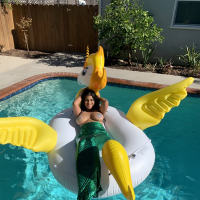 Briana Lee shows big Tits in Mermaid Suit in Pool