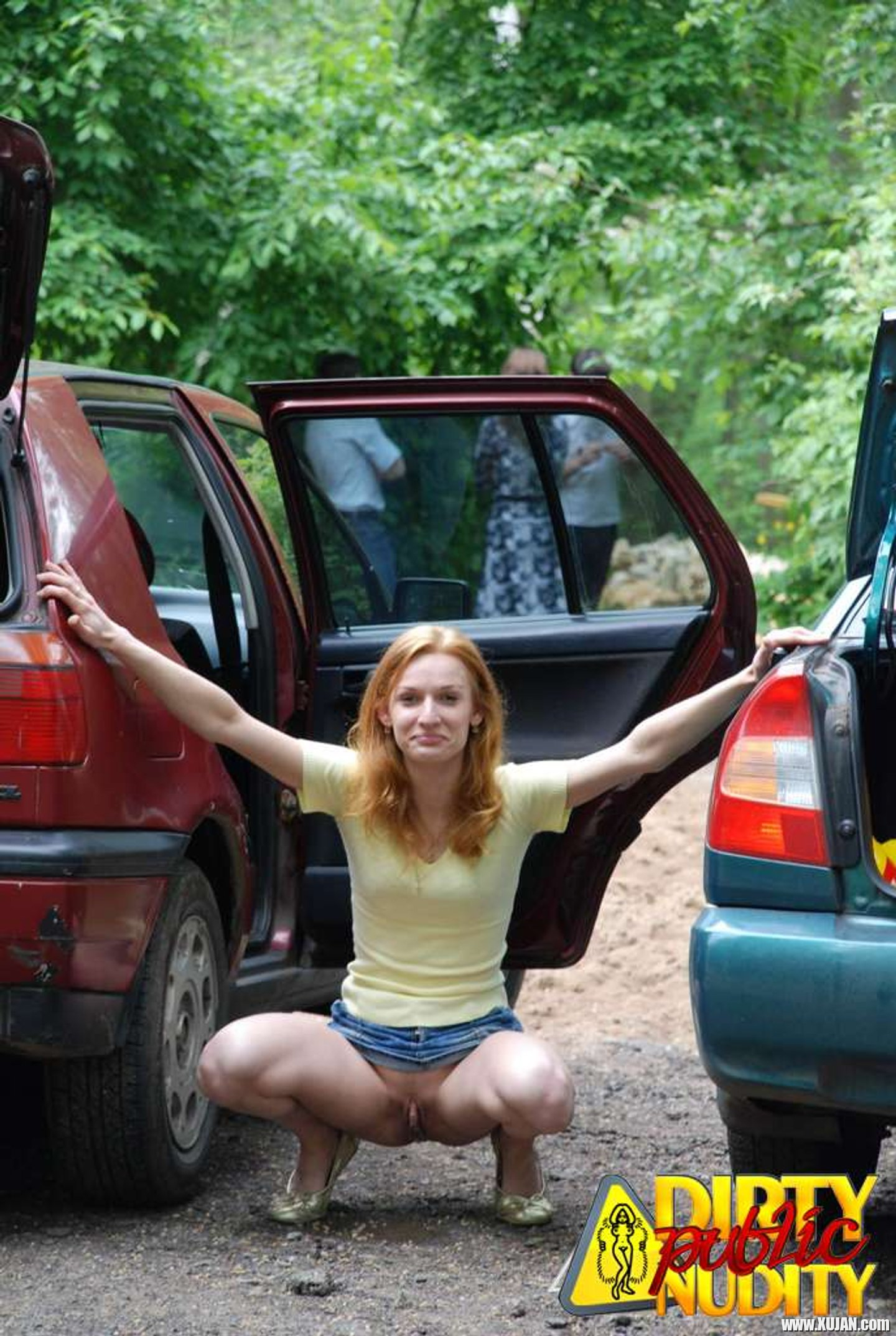 Naughty Redhead showing her Pussy in Car Park - Photo #3429308