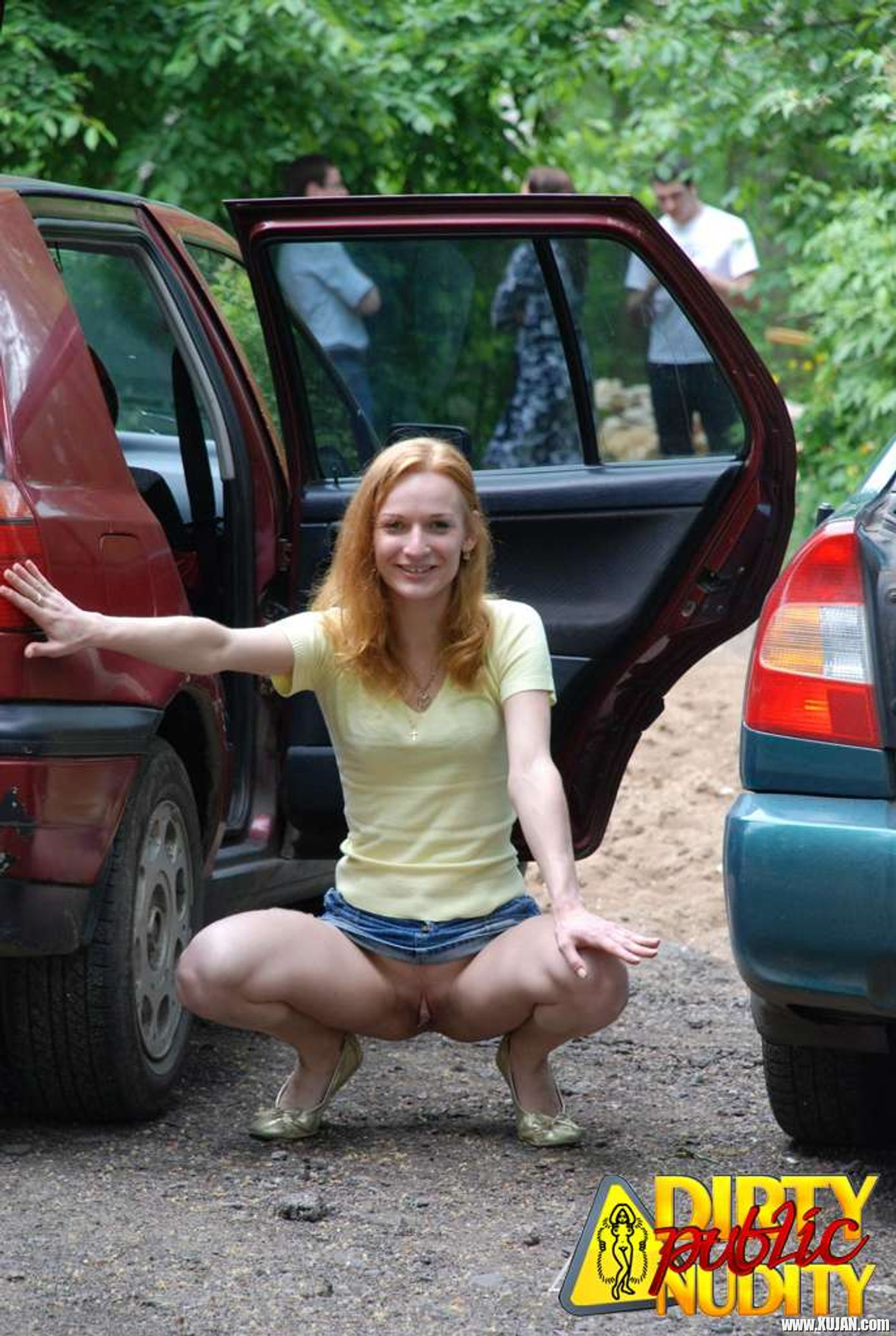Naughty Redhead showing her Pussy in Car Park - Photo #3429312