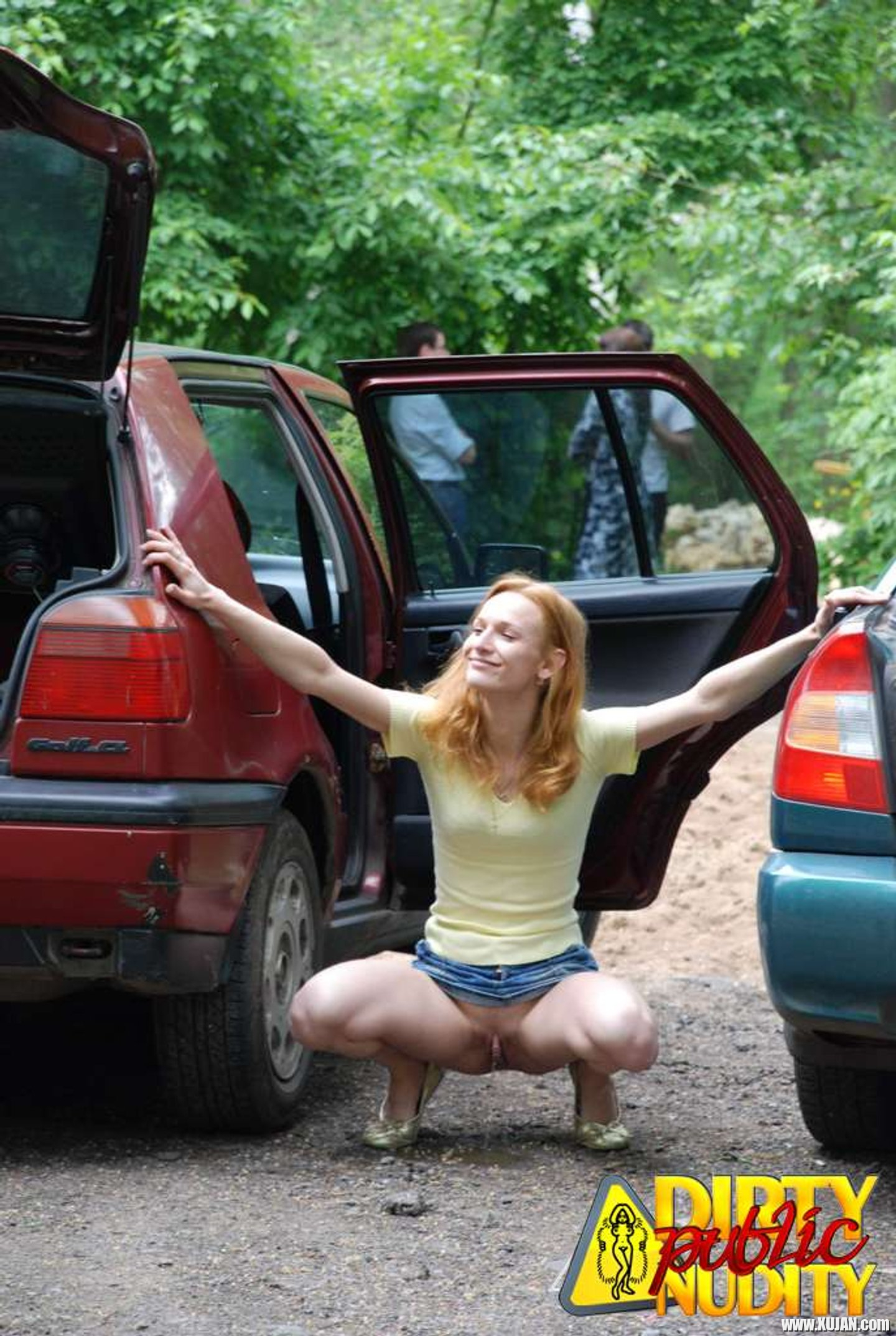 Naughty Redhead showing her Pussy in Car Park - Photo #3429314