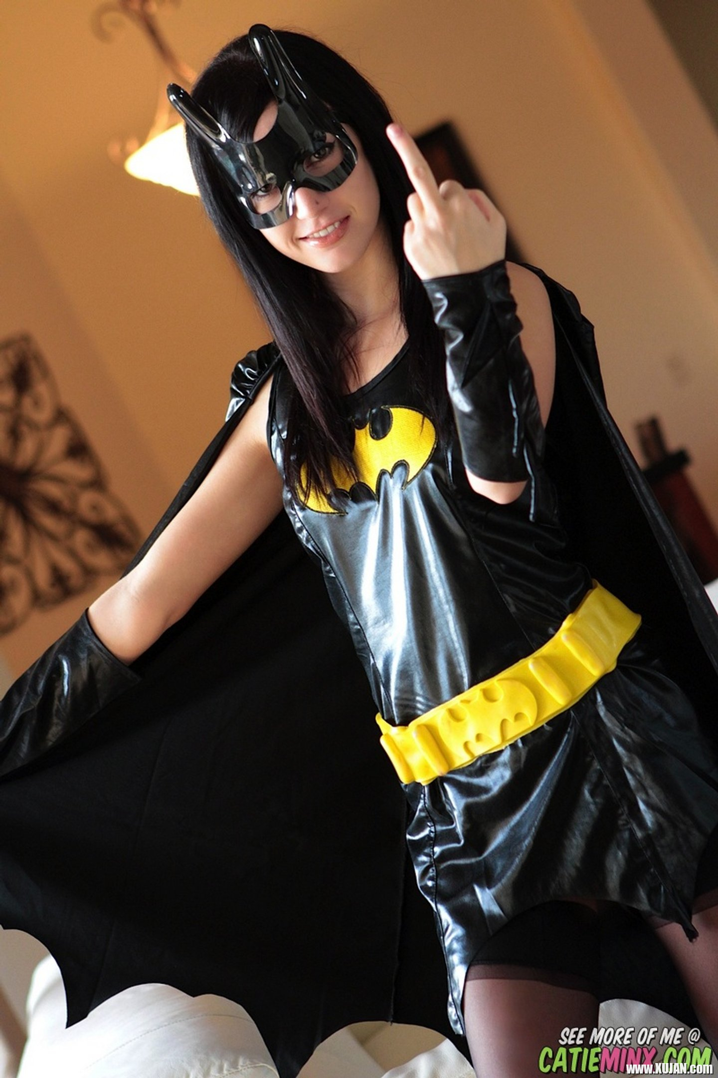Sexy Batgirl Catie Minx strips to her black Stockings - Photo #3432089
