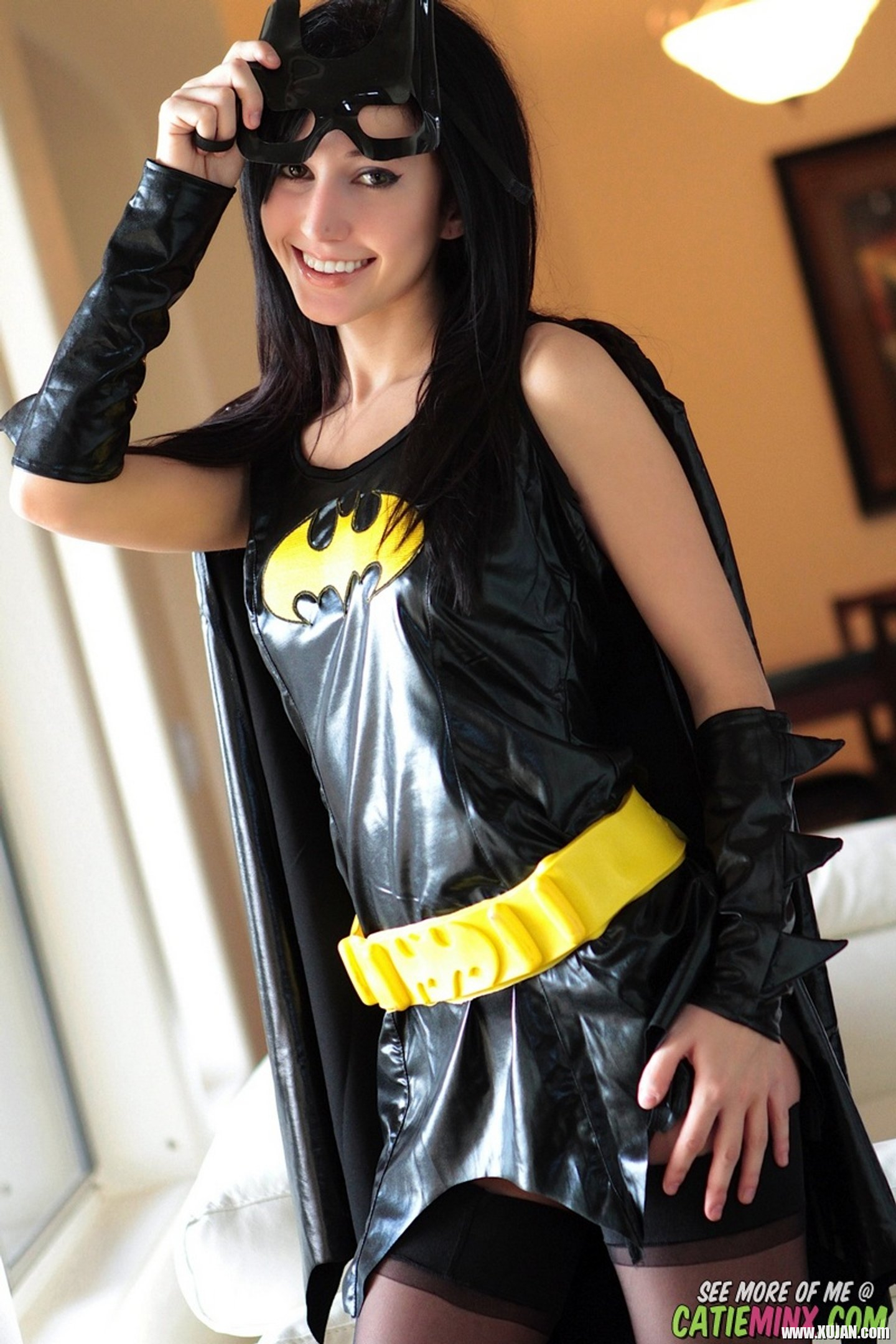 Sexy Batgirl Catie Minx strips to her black Stockings - Photo #3432090