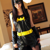 Sexy Batgirl Catie Minx strips to her black Stockings