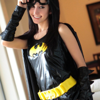 Sexy Batgirl Catie Minx strips to her black Stockings