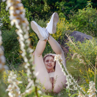 Cute young brunette girl Zhy Zhy baring it all outdoors