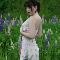 Cute Model B4rbi3 enjoys posing in a green Field