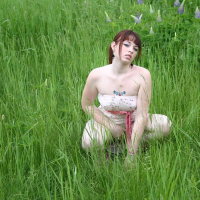 Cute Model B4rbi3 enjoys posing in a green Field