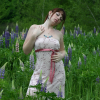 Cute Model B4rbi3 enjoys posing in a green Field