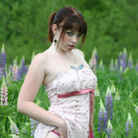 Cute Model B4rbi3 enjoys posing in a green Field