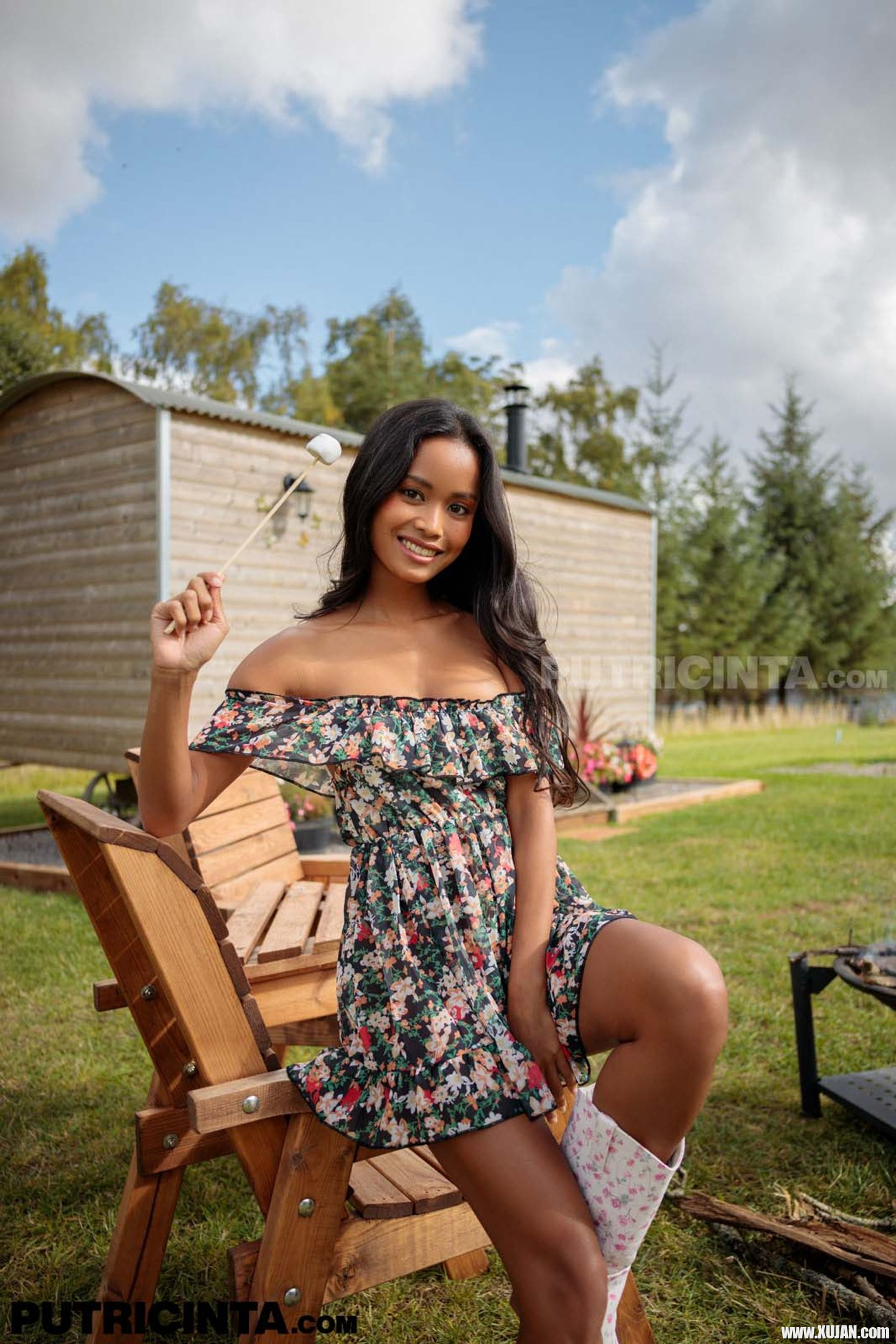Putri Cinta has a dress that magically uncovers her tits at a BBQ - Photo #3440969