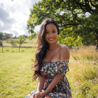 Putri Cinta has a dress that magically uncovers her tits at a BBQ