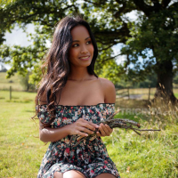 Putri Cinta has a dress that magically uncovers her tits at a BBQ