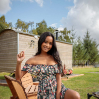 Putri Cinta has a dress that magically uncovers her tits at a BBQ