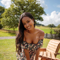 Putri Cinta has a dress that magically uncovers her tits at a BBQ