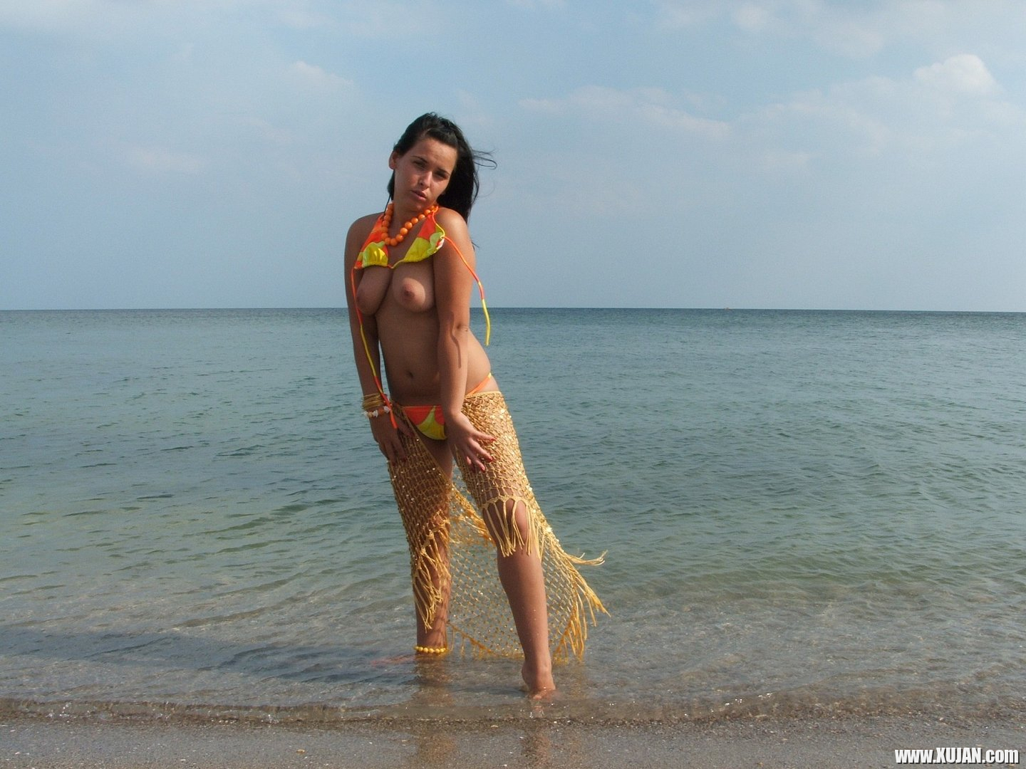 Naked Girl on the Beach cools down in the Ocean - Photo #3441393