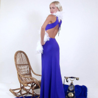 Beautiful glamour blonde lady peels off sexy blue dress