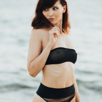 Cute Jeny Smith in Bikini shyly flashes Pussy