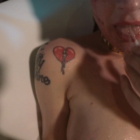 Leya Falcon washes off her Harley Quinn makeup after a cosplay party