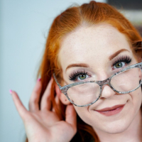 Kinky redhead teen Amy Quinn strips naked exposing her sexy curves