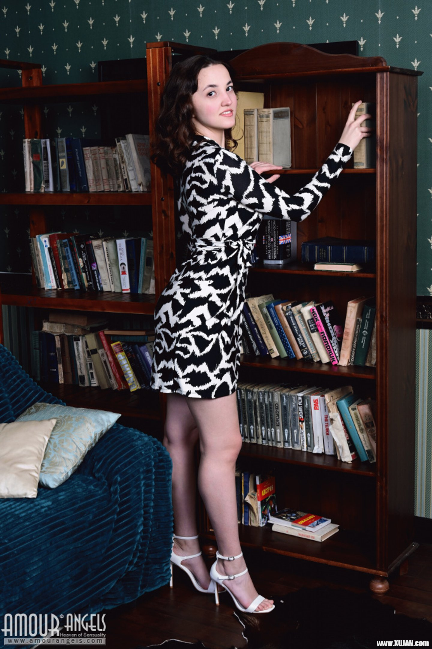 Nerdy girl Maribella loves reading and posing naked with her books - Photo #3460235