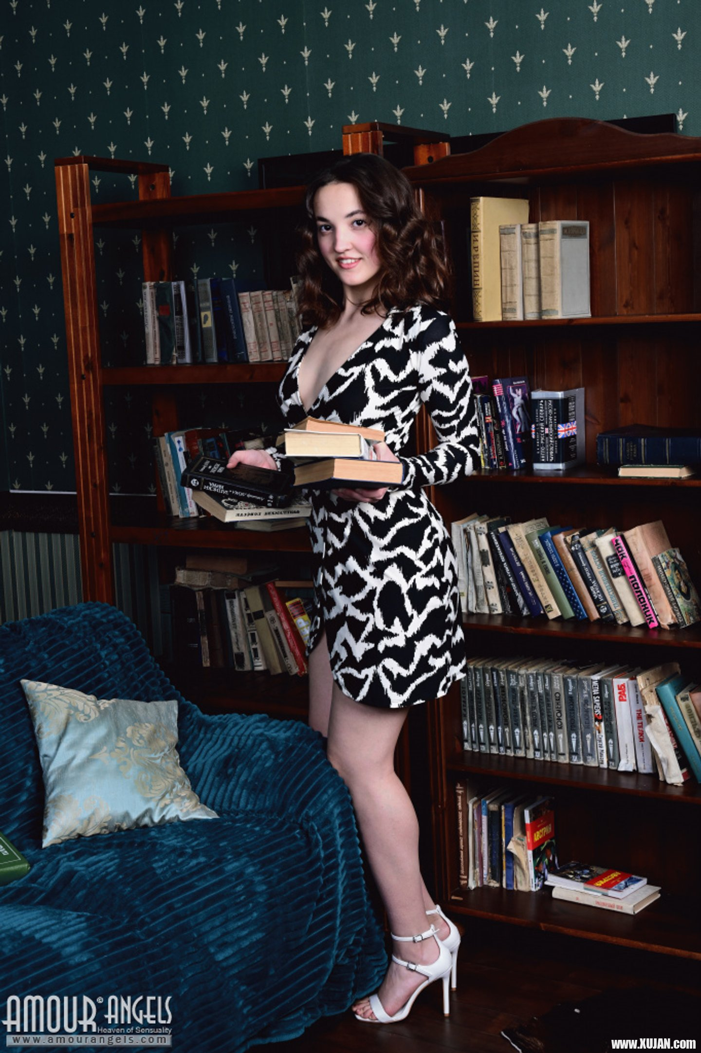 Nerdy girl Maribella loves reading and posing naked with her books - Photo #3460236