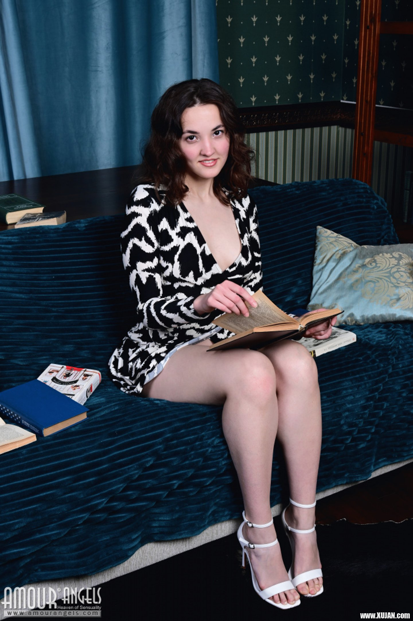 Nerdy girl Maribella loves reading and posing naked with her books - Photo #3460237