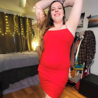 Sexy Lana Del Lust takes off her red dress while dancing on a pole