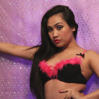 Amyka Lee using a Vibrator on her pink Asian Pussy