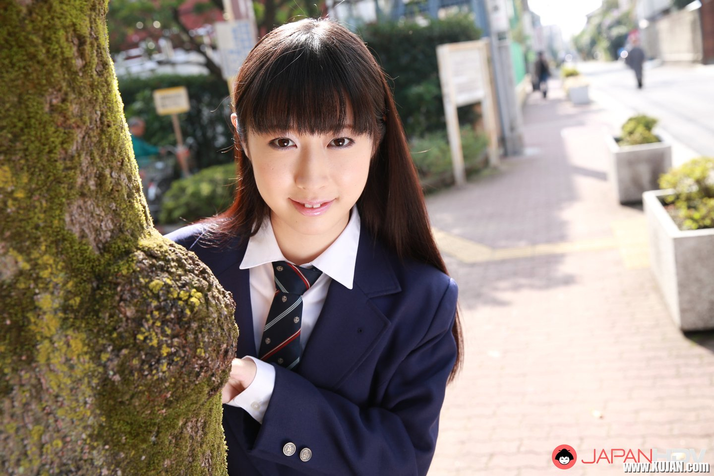 Naughty schoolgirl Tomomi Motozawa lifts up her skirt flashing panties - Photo #3469566