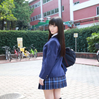 Naughty schoolgirl Tomomi Motozawa lifts up her skirt flashing panties