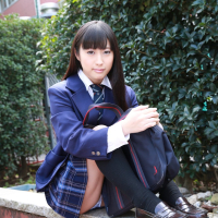 Naughty schoolgirl Tomomi Motozawa lifts up her skirt flashing panties