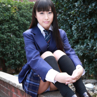 Naughty schoolgirl Tomomi Motozawa lifts up her skirt flashing panties