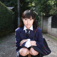 Naughty schoolgirl Tomomi Motozawa lifts up her skirt flashing panties