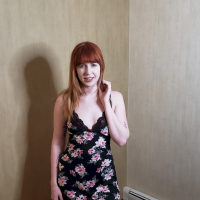 Pretty chick Hannah Grace takes off her flower dress and poses in lingerie