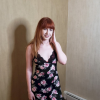 Pretty chick Hannah Grace takes off her flower dress and poses in lingerie
