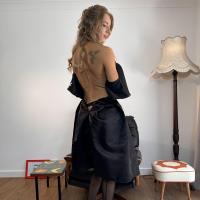 Sassy girl April Paisley in black stockings and high heels plays with pussy