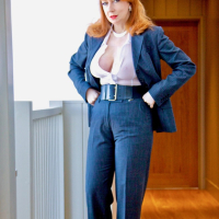 Ginger MILF Red XXX seduces in a bossy costume