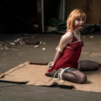 Ginger chick gets hogtied wearing red negligee