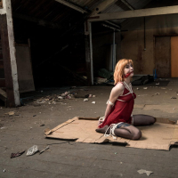Ginger chick gets hogtied wearing red negligee
