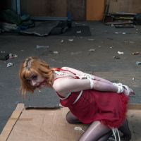 Ginger chick gets hogtied wearing red negligee