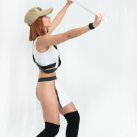 Jeny Smith wears Tight Clothes while she Poses